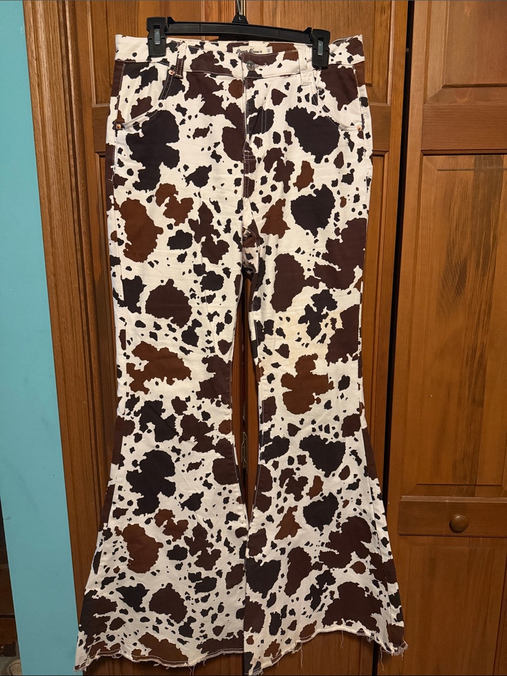 Cow print flared jeans